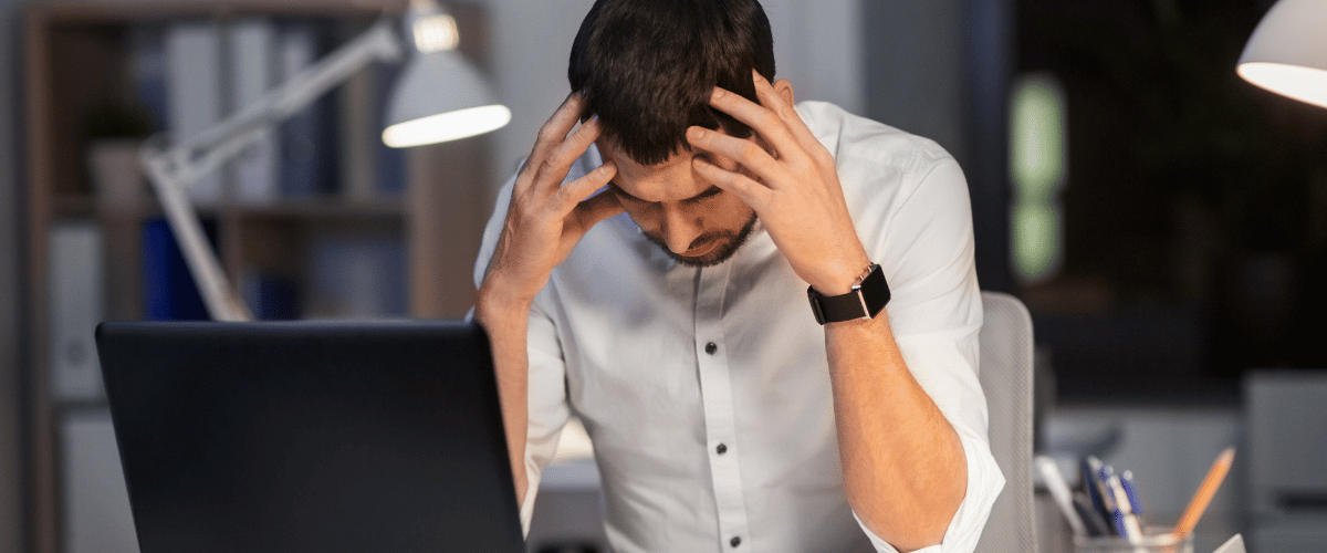 frustrated man laptop business