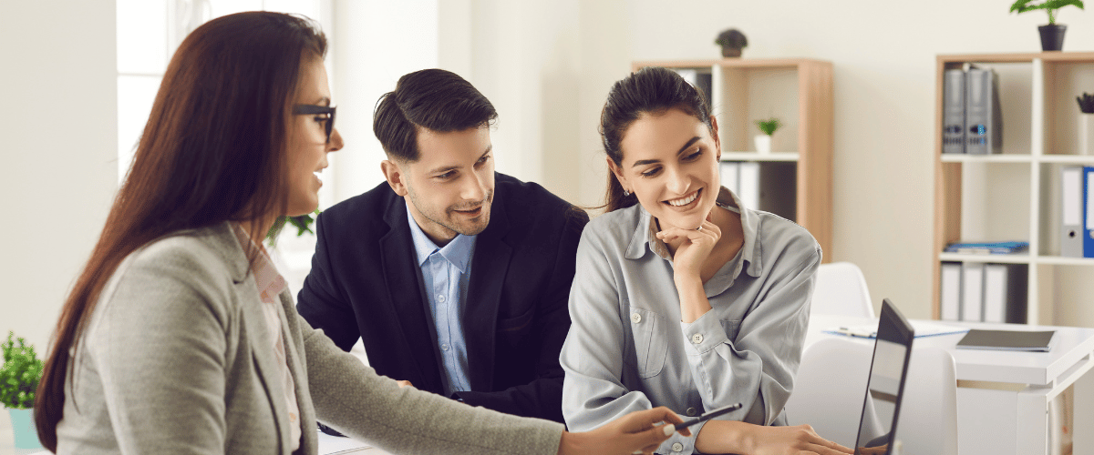 realtor smiling laptop